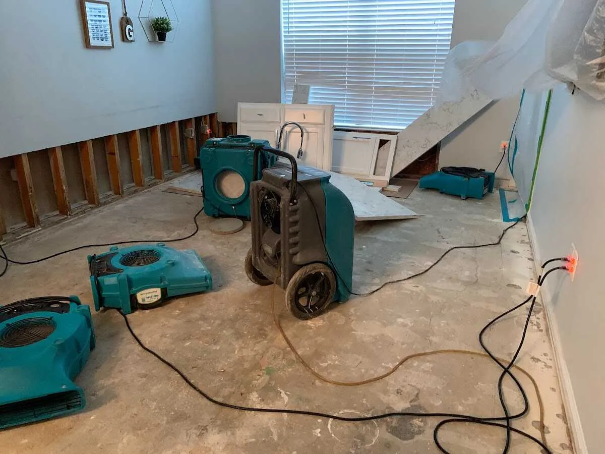 Dehumidifier in flood-cut room for Water Damage Restoration in Lower Providence